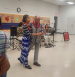 Hee-Ok and Sie-Yearl Chai showing off their dance moves